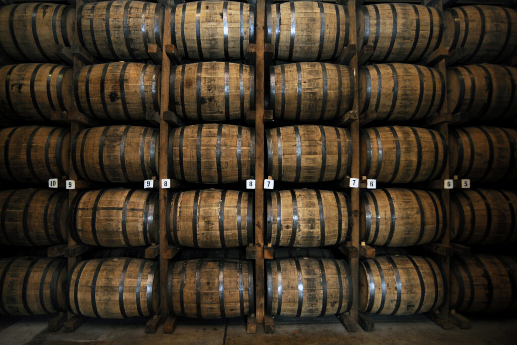 Stack of Wooden Whiskey Barrels