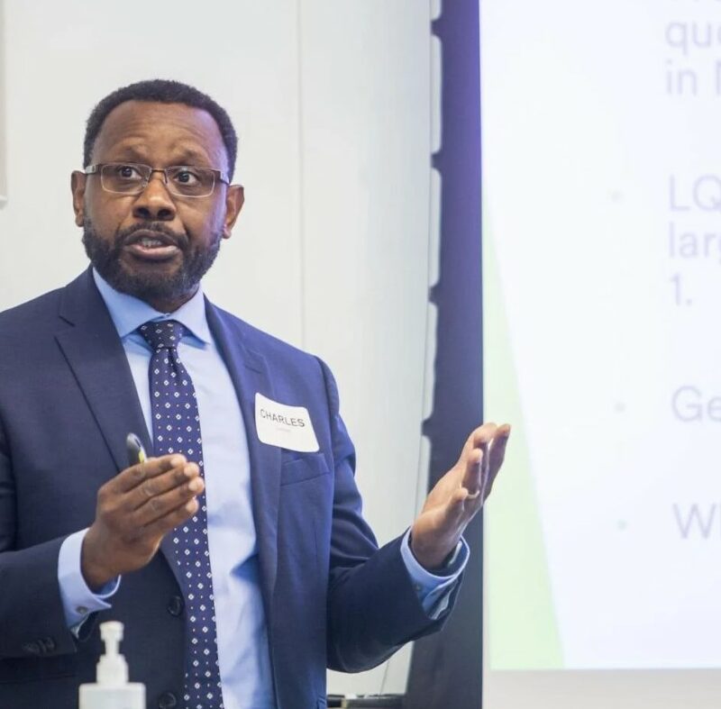 Charles Conteh, associate professor and graduate program director in the department of political science at Brock University, speaks during a meeting where initial findings in the Mapping the Economic History and Assets of Niagara in a Changing World were discussed.