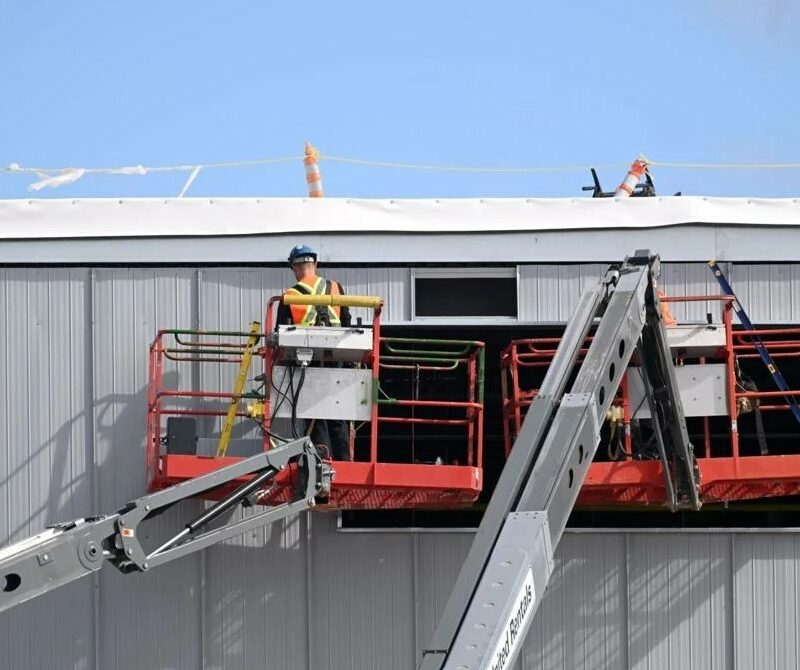 Construction crews work on the Linamar giga casting facility in Welland.