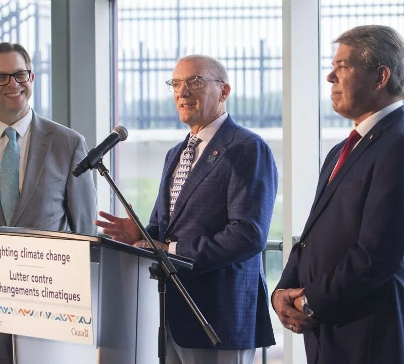 St. Catharines MP Chris Bittle, left, and Niagara Centre MP Vance Badawey, right, listen as Algoma Central Corp. president and chief executive officer Gregg Ruhl talks about funding the St. Catharines-based shipping company received under the Green Shipping Corridor Program.